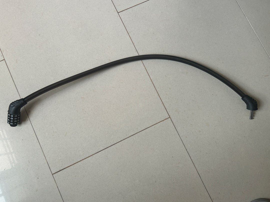 combination lock (Category: Locks, Doors & Gates) located in Singapore. Submitted by joyofcooking (Listing ID 1457566883, Image 2). Description: Strong combination lock for securing bicycle, trolley, gate etc. Able to reset combination. 64 cm..