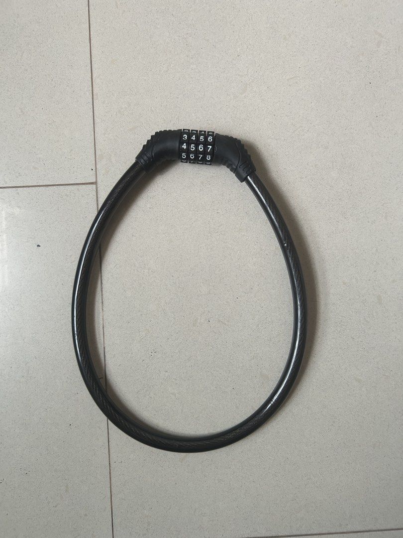combination lock (Category: Locks, Doors & Gates) located in Singapore. Submitted by joyofcooking (Listing ID 1457566883, Image 1). Description: Strong combination lock for securing bicycle, trolley, gate etc. Able to reset combination. 64 cm..