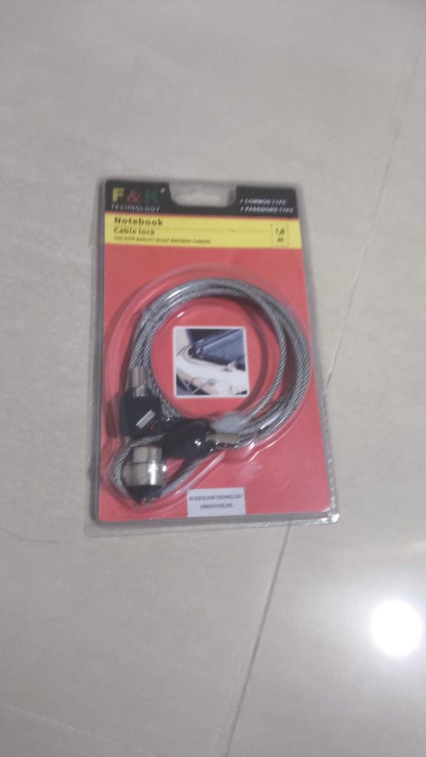 Computer lock (Category: Home Improvement Tools & Accessories) located in Singapore. Submitted by medalugaj (Listing ID 1457639440, Image 1). Description: - Brand: F&K Technology - Product Type: Notebook Cable Lock - Security Type: Common Type - Material: High-quality Alloy - Includes: Keys for secure locking - Ideal for protecting laptops and notebooks from theft.
