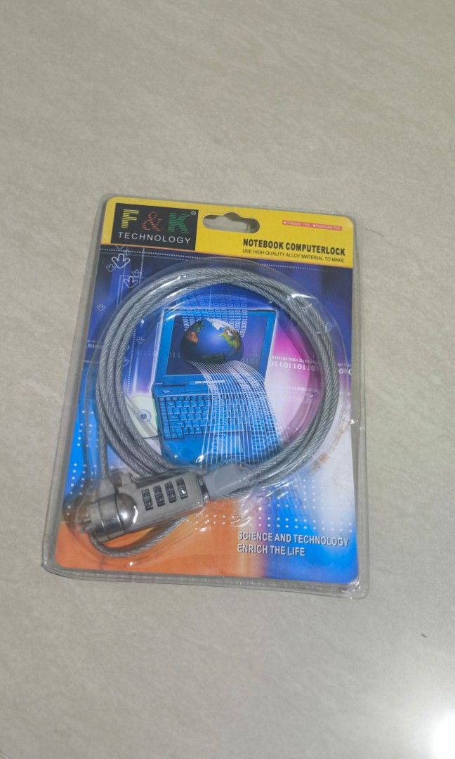 Computer lock (Category: Home Improvement Tools & Accessories) located in Singapore. Submitted by medalugaj (Listing ID 1457639440, Image 2). Description: - Brand: F&K Technology - Product Type: Notebook Cable Lock - Security Type: Common Type - Material: High-quality Alloy - Includes: Keys for secure locking - Ideal for protecting laptops and notebooks from theft.
