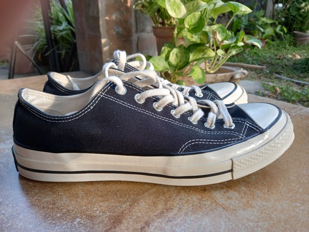 Converse Chuck Taylor All Star 70s Low Top Black (Category: Sneakers) located in Davao. Submitted by kirk214red-50020 (Listing ID 1457708245, Image 3). Description: - Classic black Converse Chuck Taylor All Star 70s low tops - Features white laces and white toe cap - Cream sole for a vintage look - Ideal for everyday wear - A versatile staple that pairs easily with any outfit.