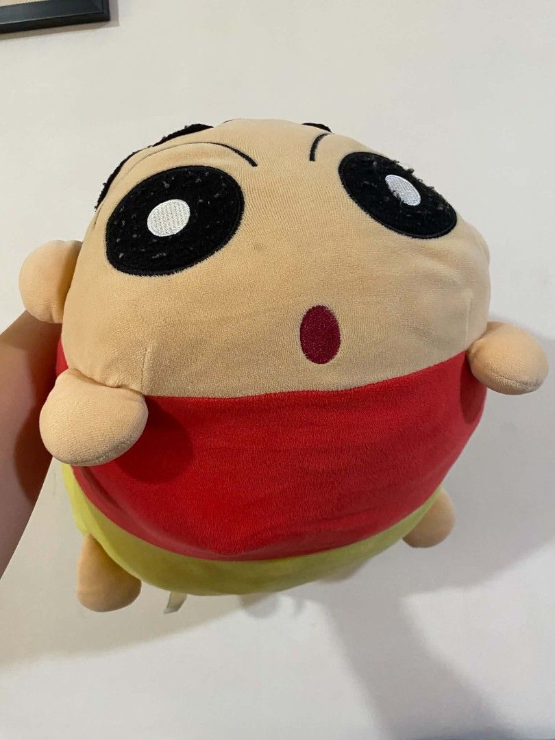Crayon Shin-chan Plush Toy Pillow (Category: Plushies & Soft Toys) located in Quezon City. Submitted by marcplusclein (Listing ID 1457575580, Image 2). Description: - Adorable Crayon Shin-chan plush toy - Round and squishy design, perfect for hugging or using as a pillow - Features Shin-chan's signature surprised expression - Made from soft and cuddly material - Ideal for Shin-chan fans and as a fun room decoration.