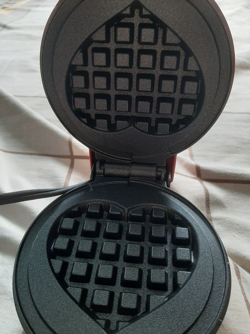 Dash Mini Waffle Maker 110V Brand New Old Stock (Category: Other Kitchen Appliances) located in Manila. Submitted by akikooya (Listing ID 1457639683, Image 3). Description: PAUNAHAN NA! DASH MINI WAFFLE MAKER BUNDLE ₱2300 Take all 2pcs na to! *DASH HEART + DASH FLOWER Mini Waffle Maker* *Condition:* Brand new in box. Hindi nagamit. *Disclaimer:* Box lang ang may sign of aging kasi old stock. Item 100% new. *Voltage:* 110V US - so need mo bumili n