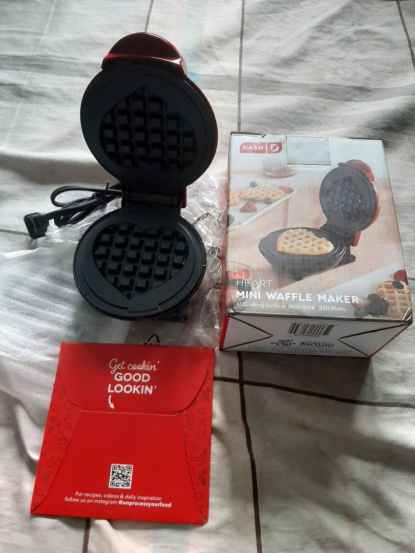 Dash Mini Waffle Maker 110V Brand New Old Stock (Category: Other Kitchen Appliances) located in Manila. Submitted by akikooya (Listing ID 1457639683, Image 2). Description: PAUNAHAN NA! DASH MINI WAFFLE MAKER BUNDLE ₱2300 Take all 2pcs na to! *DASH HEART + DASH FLOWER Mini Waffle Maker* *Condition:* Brand new in box. Hindi nagamit. *Disclaimer:* Box lang ang may sign of aging kasi old stock. Item 100% new. *Voltage:* 110V US - so need mo bumili n