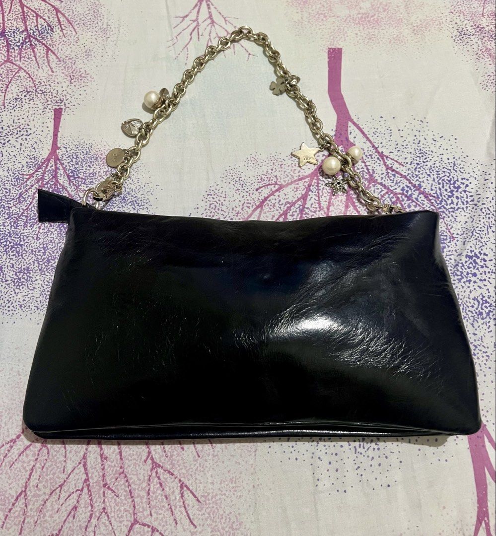 Dior Black Leather Shoulder Bag with Charms (Category: Luxury Bags & Wallets) located in Dagupan City. Submitted by casadebayongph (Listing ID 1457648311, Image 3). Description: - Black Dior Shoulder Bag - Genuine Leather with Embossed Dior Logo - Secure Zipper Closure - Dior Branded Interior Lining - Silver-Tone Chain Strap with Star and Pearl Charms - Ideal for Casual Outings and Everyday Style.