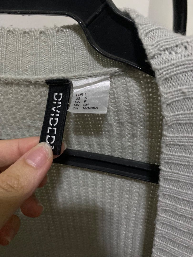 Divided by H&M Grey Knit Cardigan (Category: Coats, Jackets and Outerwear) located in Santa Rosa. Submitted by rockitlee (Listing ID 1457535059, Image 3). Description: - Divided by H&M Grey Knit Cardigan - Size: S - Features ribbed texture throughout - Simple and versatile design - Ideal for layering.