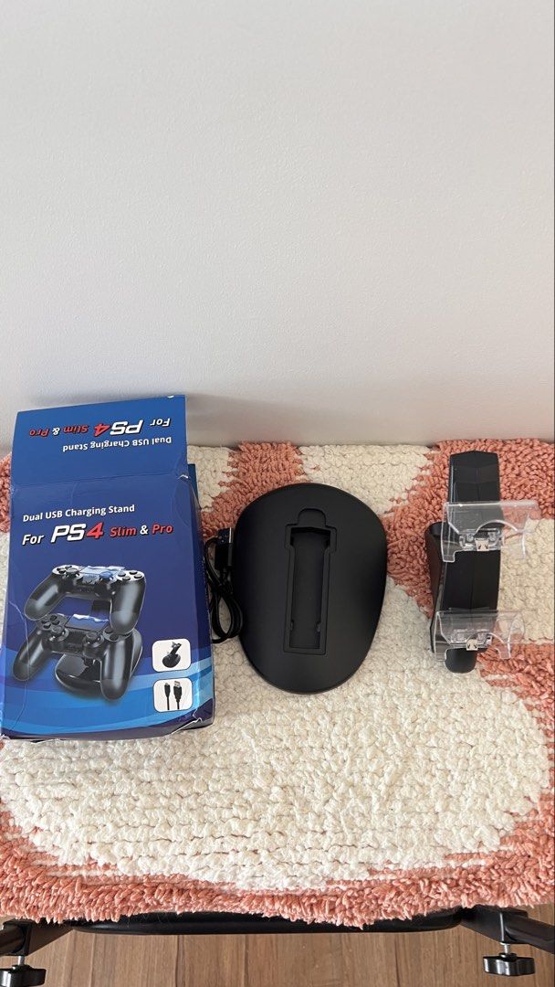 Dual USB Charging Stand for PS4 Slim & Pro Controllers (Category: Controllers) located in Cebu City. Submitted by shopgalora (Listing ID 1457547610, Image 2). Description: - Charge up to 2 PS4 controllers simultaneously. - Compatible with PS4 Slim and PS4 Pro models. - Sleek black design. - Includes USB cable for easy power-up. - Keep your controllers charged and ready for action. - Perfect addition to any PS4 gaming setup..