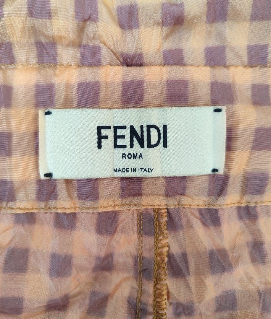 Fendi Gingham Silk Paper Bag Short (Category: Shorts) located in Bayambang. Submitted by mon10192816 (Listing ID 1457645975, Image 3). Description: - Waist 27-32 - Length 17.5 - Fendi shorts - High-waisted design - Comfortable elasticated waistband - Two convenient side pockets - Made in Italy - Size M - Ideal for stylish casual wear.
