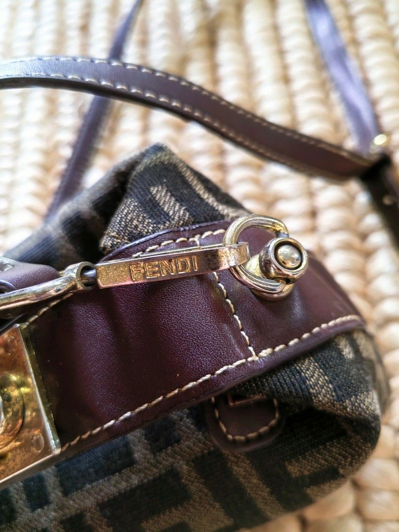 Fendi Zucca Canvas Mini Baguette Bag (Category: Luxury Bags & Wallets) located in Davao. Submitted by gelleevanelli (Listing ID 1457547754, Image 3). Description: *Vintage Fendi Zucca Canvas Mini Doctor Boxy Bag* *Condition:* Vintage / Pre-loved - *Exterior*: Zucca FF jacquard canvas in brown/tobacco. Pattern is aligned and weave is tight. - *Leather*: Dark brown leather trim + strap with white contrast stitching. _Note: peeling/wear on leather n