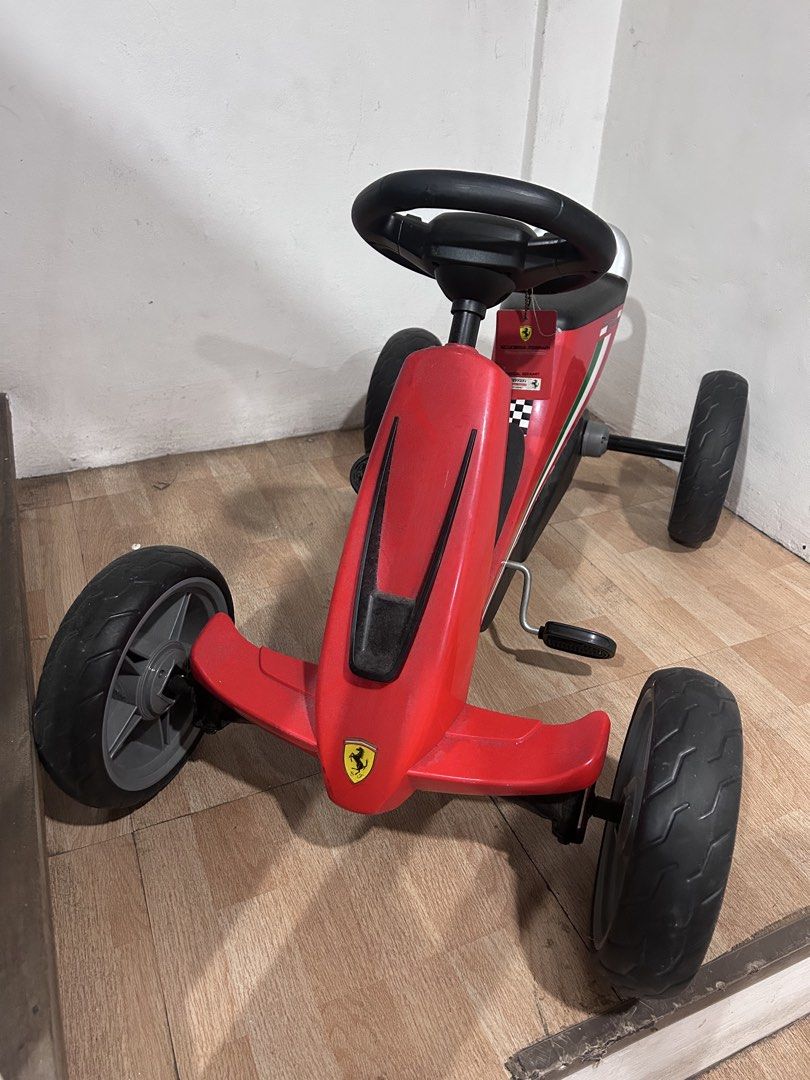 Ferrari Go Kart (Category: Kids Toys) located in Del Monte. Submitted by cheezy_aissa (Listing ID 1457581454, Image 1). Description: KIDS-FRIENDLY GO KART - Ferrari four-wheeled pedal go kart is recommended for ages 2-6 years old. It has adjustable steering wheels and saddle so it virtually grows with your child SUPER LIGHT PEDALING AND CONTROLLED STEERING - You have full control of the steering wheel and pedals as they are operated independently