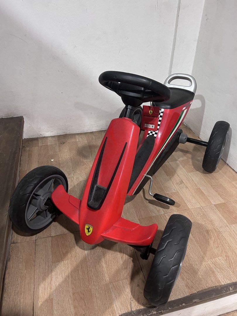 Ferrari Go Kart (Category: Kids Toys) located in Del Monte. Submitted by cheezy_aissa (Listing ID 1457581454, Image 2). Description: KIDS-FRIENDLY GO KART - Ferrari four-wheeled pedal go kart is recommended for ages 2-6 years old. It has adjustable steering wheels and saddle so it virtually grows with your child SUPER LIGHT PEDALING AND CONTROLLED STEERING - You have full control of the steering wheel and pedals as they are operated independently