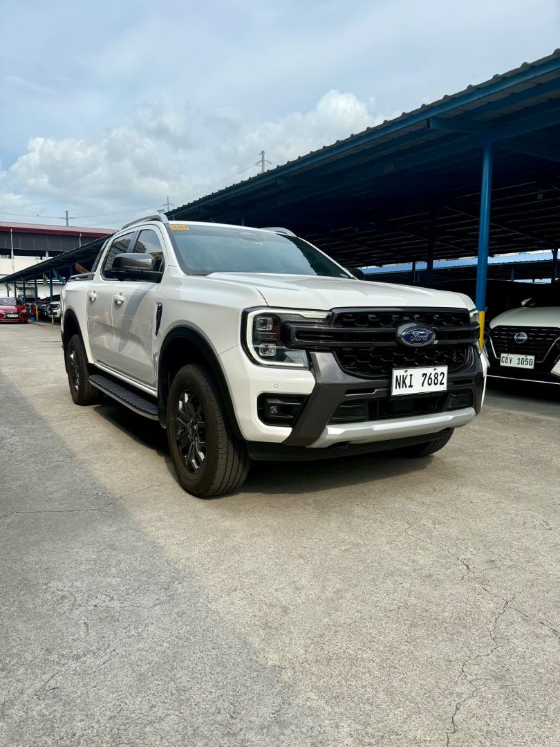 Ford RANGER WILDTRAK 4X4 Auto (Category: Used Cars) located in Quezon City. Submitted by jayjet.jayjet (Listing ID 1457533742, Image 3). Description: 2024 FORD RANGER WILTRAK 4X4 Automatic Transmission 5t km only Diesel Paddle shift Cruise Control Push Start Engine Genuine Leather All Power All Original No Issues No Accidents Well Kept Mechanic Inspected Complete Tools, Jack and Spare Tire Price P1.398M Slightly negotiable upon viewing Financing/