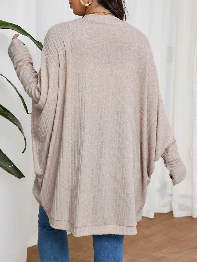 Forever 21 Lightweight Ribbed Open Cardigan (Category: Coats, Jackets and Outerwear) located in Pasuquin. Submitted by gabelli.declutters (Listing ID 1457555892, Image 1). Description: Condition: 9/10 (Excellent preloved condition, no tears) Product Details: Brand: Forever 21Size: Small (S) on tag (Fits true to size, slightly relaxed fit) Color: Light Beige / Cream / Oatmeal Material: Lightweight ribbed knit fabric (very soft and breathable, perf