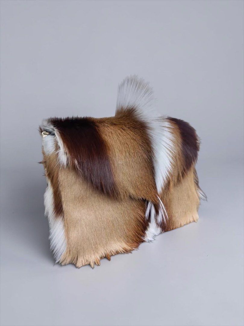 Fur Bag Antelope Leather Cowhide Handle (Category: Luxury Bags & Wallets) located in Manila. Submitted by designerarchives.ph (Listing ID 1457698298, Image 3). Description: Lining Material: Sheepskin Texture: Mink Hair Closure: Magnetic Buckle Comes with FREE WALLET. Same material Tote Bag — ₱18 500 Envelope Bag - ₱16 500 How to order? • 50% DP is required • 2 weeks eta • Buyer will shoulder the sf.