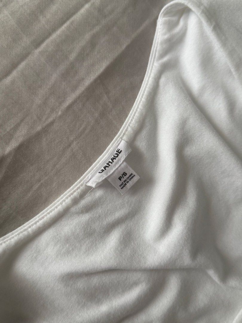 Garage White Square Neck Ruched Tank Top (S) (Category: Sleeveless) located in Quezon City. Submitted by ak3isha (Listing ID 1457565540, Image 2). Description: - Features a square neckline - Ruched sides for a flattering fit *NEVER WORN.