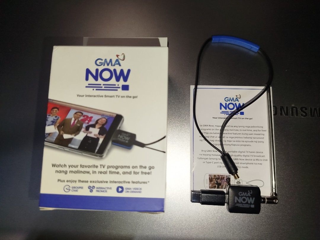 GMA Now Interactive Smart TV Dongle for Mobile (Category: Cables & Adaptors) located in San Juan City. Submitted by carljr21 (Listing ID 1457543014, Image 2). Description: Brandnew condition, no defects. - Watch your favorite GMA shows live on the go. - Access interactive features, groupie chat, and exclusive promos. - Enjoy on-demand videos anytime, anywhere. - Connects to your smartphone for a smart TV experience. - Compact and portable design 