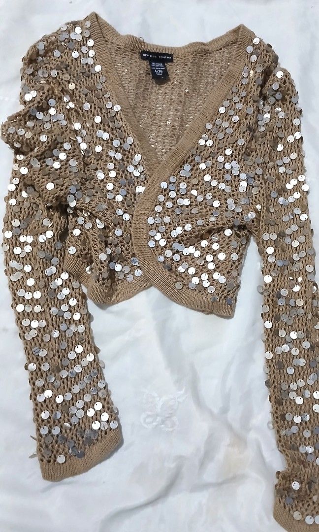 Gold sequined knitted bolero (Category: Coats, Jackets and Outerwear) located in Quezon City. Submitted by nette69 (Listing ID 1457659657, Image 1). Description: vintage sequined bolero. beige crochet adorned with shimmering sequins to add glamour to your outfits. size small to medium.