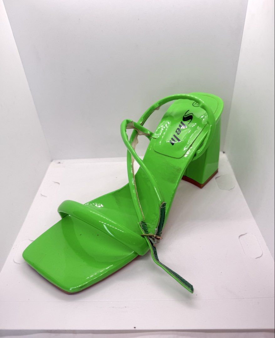 Green block heel sandals 7.5 US (Category: Heels) located in Mandaluyong City. Submitted by cherryspicks (Listing ID 1457625861, Image 3). Description: Size US 7.5. Used once only. Bright neon green , comfortable height. Some parts of the strap have come loose, but one can easily stick them back together with super glue! .
