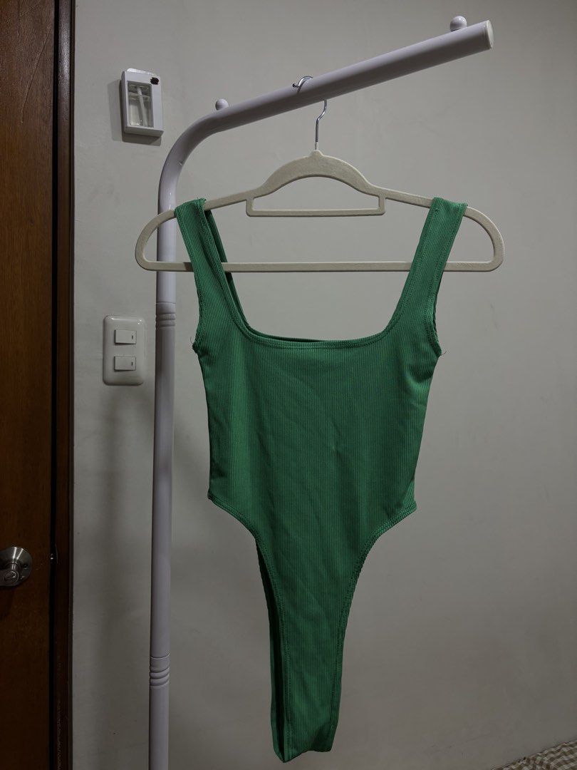 Green Ribbed Square Neck High Cut Bodysuit (Category: Others Tops) located in Manila. Submitted by declutterwith_nics (Listing ID 1457611978, Image 1). Description: - Green ribbed bodysuit - Square neckline - High-cut leg - Stretchy material for a comfortable fit - Perfect for layering or wearing on its own - Pairs well with jeans or shorts - Stylish and versatile.