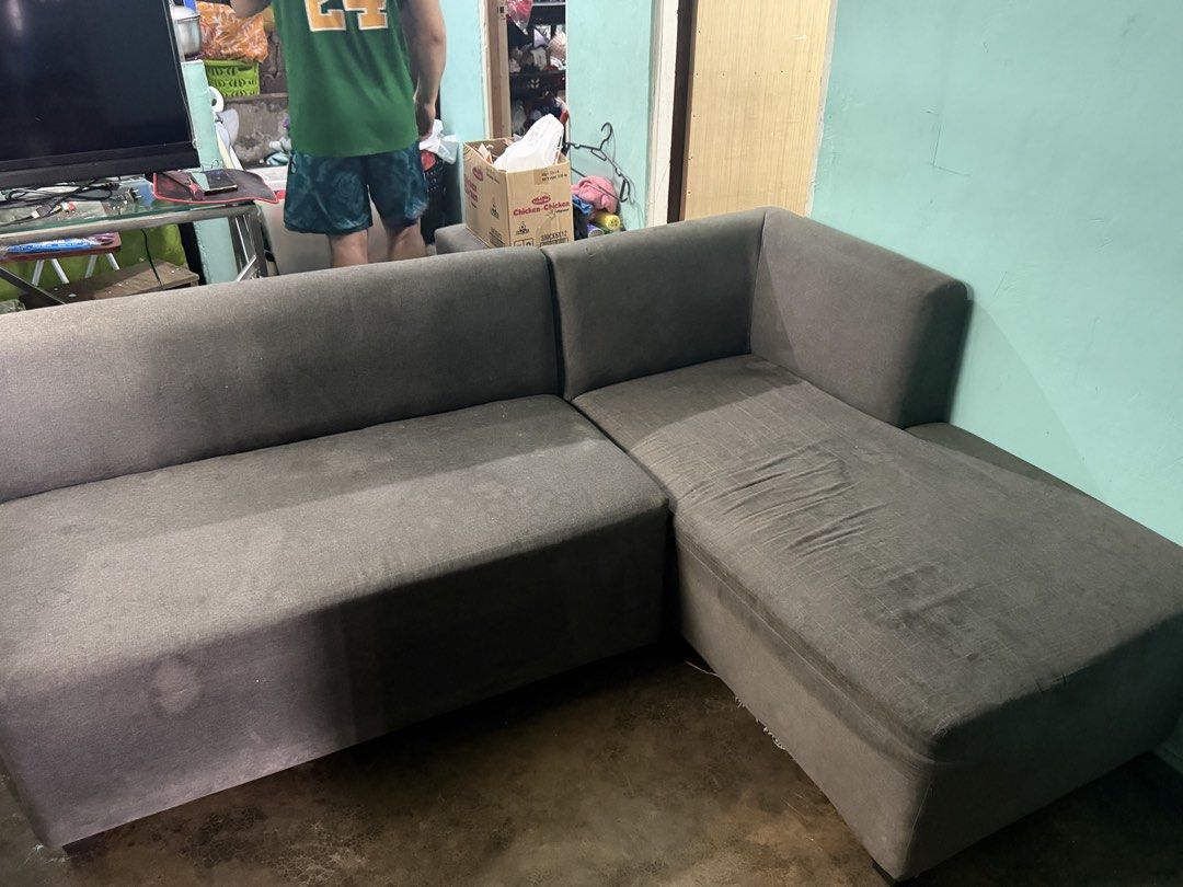 Grey L-Shaped Sectional Sofa (Category: Sofas) located in Cavite. Submitted by prjsarisaristore (Listing ID 1457519139, Image 2). Description: - Grey L-shaped sectional sofa - Upholstered in durable fabric - Ample seating space, perfect for living rooms or lounges - Minor signs of wear on the chaise cushion For sale sofa Pakilinisan na lang… Pwede niyo po icheck Loc 227 salinas 1 bacoor cavite Sa prj sari sari store Rfs mag upgrade po.