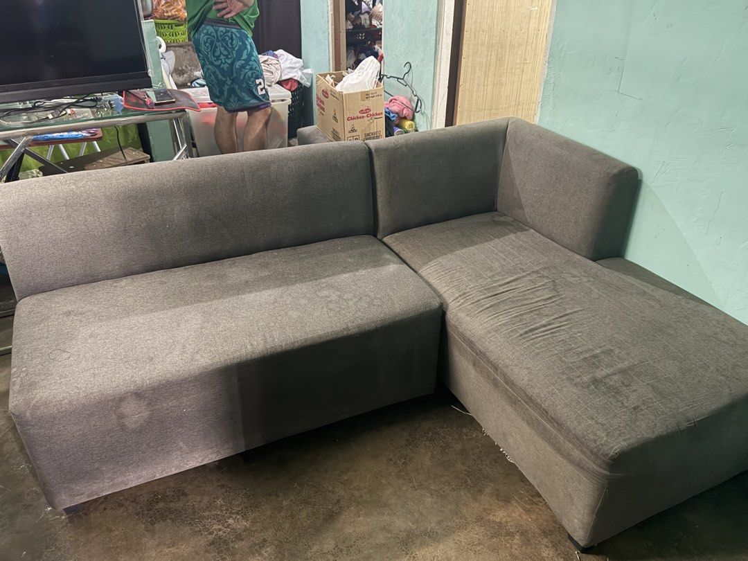 Grey L-Shaped Sectional Sofa (Category: Sofas) located in Cavite. Submitted by prjsarisaristore (Listing ID 1457519139, Image 1). Description: - Grey L-shaped sectional sofa - Upholstered in durable fabric - Ample seating space, perfect for living rooms or lounges - Minor signs of wear on the chaise cushion For sale sofa Pakilinisan na lang… Pwede niyo po icheck Loc 227 salinas 1 bacoor cavite Sa prj sari sari store Rfs mag upgrade po.
