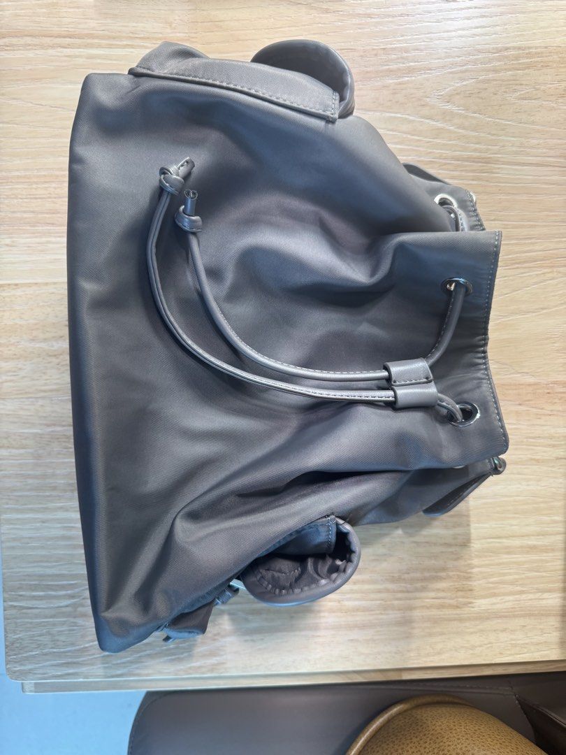 Grey Nylon Drawstring (Category: Shoulder Bags) located in Singapore. Submitted by imsobrokett (Listing ID 1457603321, Image 1). Description: used only once or twice fast deal for $20.