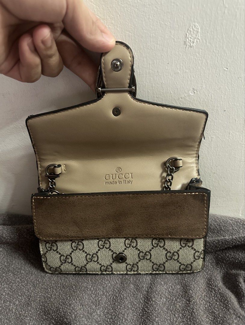 Gucci Dionysus Wallet with Chain (Category: Luxury Bags & Wallets) located in Tarlac. Submitted by wearagainboutique (Listing ID 1457591699, Image 3). Description: - PROJECT BAG - Beige and Brown GG Supreme Canvas - Signature Dionysus Tiger Head Spur - Leather Trim and Suede Detail - Detachable Chain Strap Included - Made in Italy -No Code -Flaws see last picture .