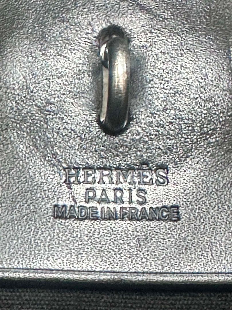 Hermes 35cm Herbag (Category: Luxury Bags & Wallets) located in Albuera. Submitted by zaraofdammam09 (Listing ID 1457518508, Image 2). Description: Herbag by Hermès in black canvas and black leather, with palladium hardware, a leather top handle, and a shoulder strap for hand, shoulder, or cross-body wear. Details: Flap with link fastener Black canvas lining Includes keys, padlock and clochette Stamped Condition: Very good.