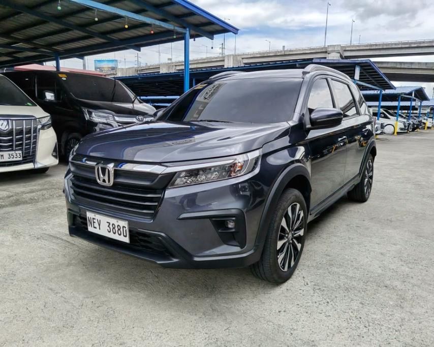 Honda BR-V (Category: Used Cars) located in Quezon City. Submitted by jayjet.jayjet (Listing ID 1457534599, Image 1). Description: 2024 HONDA BRV S Automatic Transmission Airbags 9tkm No Issues No Accidents All Power All Original Fresh In and Out Mechanic Inspected Complete Tools, Jack and Spare Tire Price P 828k Financing/Trade-in Accepted Sample Financing Computations Down P165k all in P23k+ 4yrs P29k+ 3yrs Down P250k all in P20k+ 4yrs P25k+ 3y