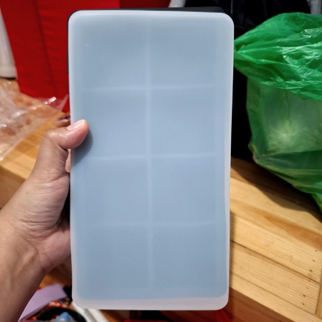 Ice cube Large Silicon Molder Tray (Category: Food Organization & Storage) located in Quezon City. Submitted by an.marie (Listing ID 1457592365, Image 1). Description: Large ice tray with lid. Makes big ice cubes. Silicone material. Easy to use..