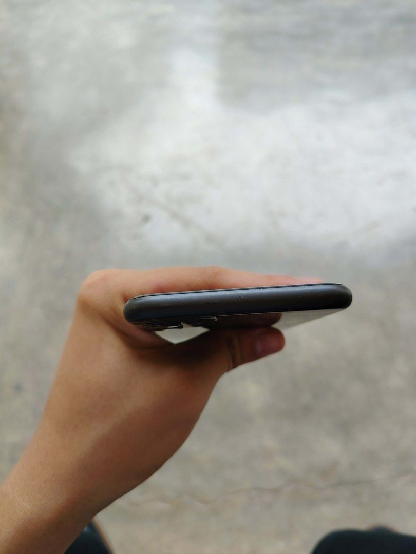 Iphone 11 sale or swap to android or ios (Category: iPhone 11 Series) located in Manila. Submitted by juswa_825 (Listing ID 1457650868, Image 2). Description: 128gb 73% Batt Health Replaced battery 2 years ago pero original battery ginamit makunat kunat parin kasi original naman pinalit No iCloud issues Working face id working true tone updated sa ios 26 comes with an apple charger Minor scratches lang sa gilid due to the hard casing na gamit ko 
