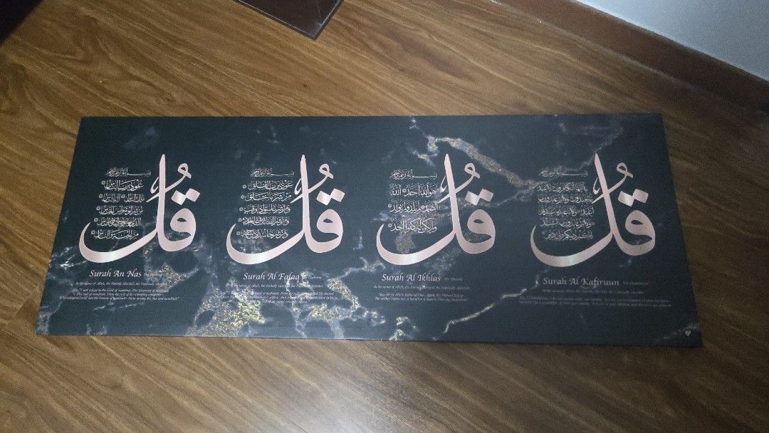 Islamic Calligraphy Canvas Print - Surahs An Nas, Falaq, Ikhlas, Kafirun (Category: Wall Decor) located in Singapore. Submitted by food_chef (Listing ID 1457547098, Image 1). Description: - Bought @ $100+ - Islamic calligraphy canvas print - Features Surahs An Nas, Al-Falaq, Al-Ikhlas, Al-Kafirun - Rose gold Arabic script - Dark marble background - Size: Approx. 45cm x 120cm - Ideal for home decor Self collect @ Sembawang.
