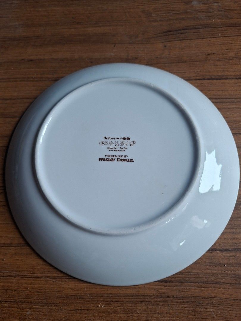 Kanahei's Small Animals Plate (Category: Dinnerware & Cutlery) located in Consolacion. Submitted by luxekerei (Listing ID 1457572121, Image 2). Description: - Kanahei's Small Animals Piske & Usagi Party Plate from a Mister Donut holiday collaboration. - features Piske (the white bird) and Usagi (the pink rabbit) next to a decorated party cake. - Measures approximately 20 to 21 centimeters in diameter - Made of ceramic tableware.