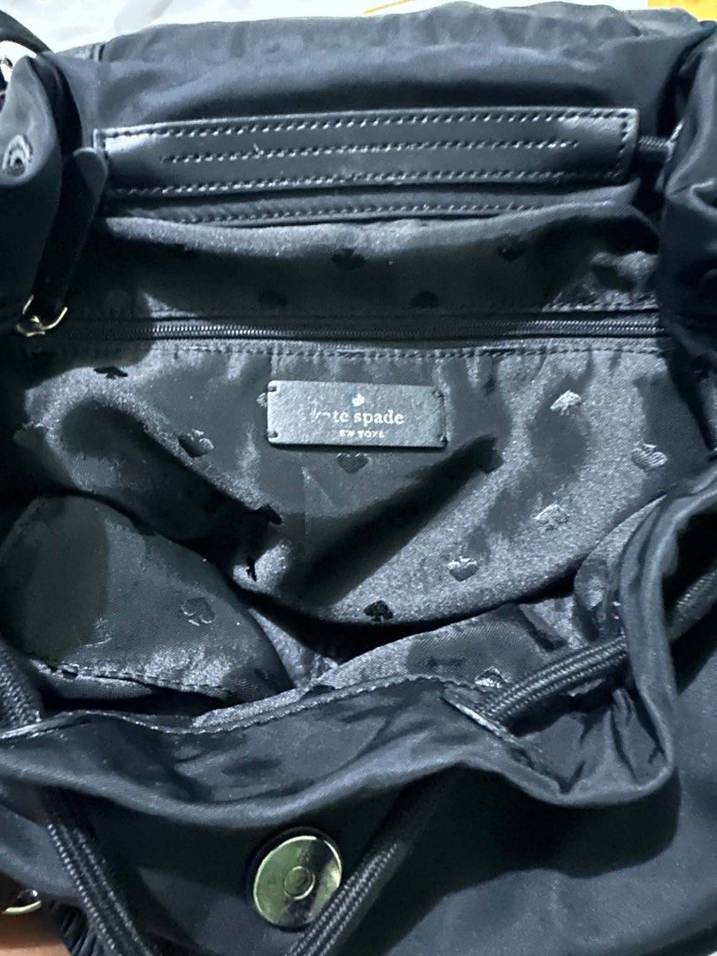 Kate Spade New York Carley Backpack Medium Nylon Black (Category: Backpacks) located in Quezon City. Submitted by hacked.233 (Listing ID 1457572483, Image 3). Description: - Brand: Kate Spade New York - Material: Black Nylon - Model: Carley - Size: Medium - Closure: Drawstring with flap top and magnetic snap - Features: Multiple front and side pockets for easy access - Straps: Adjustable shoulder straps - Ideal for: Everyday use or travel.
