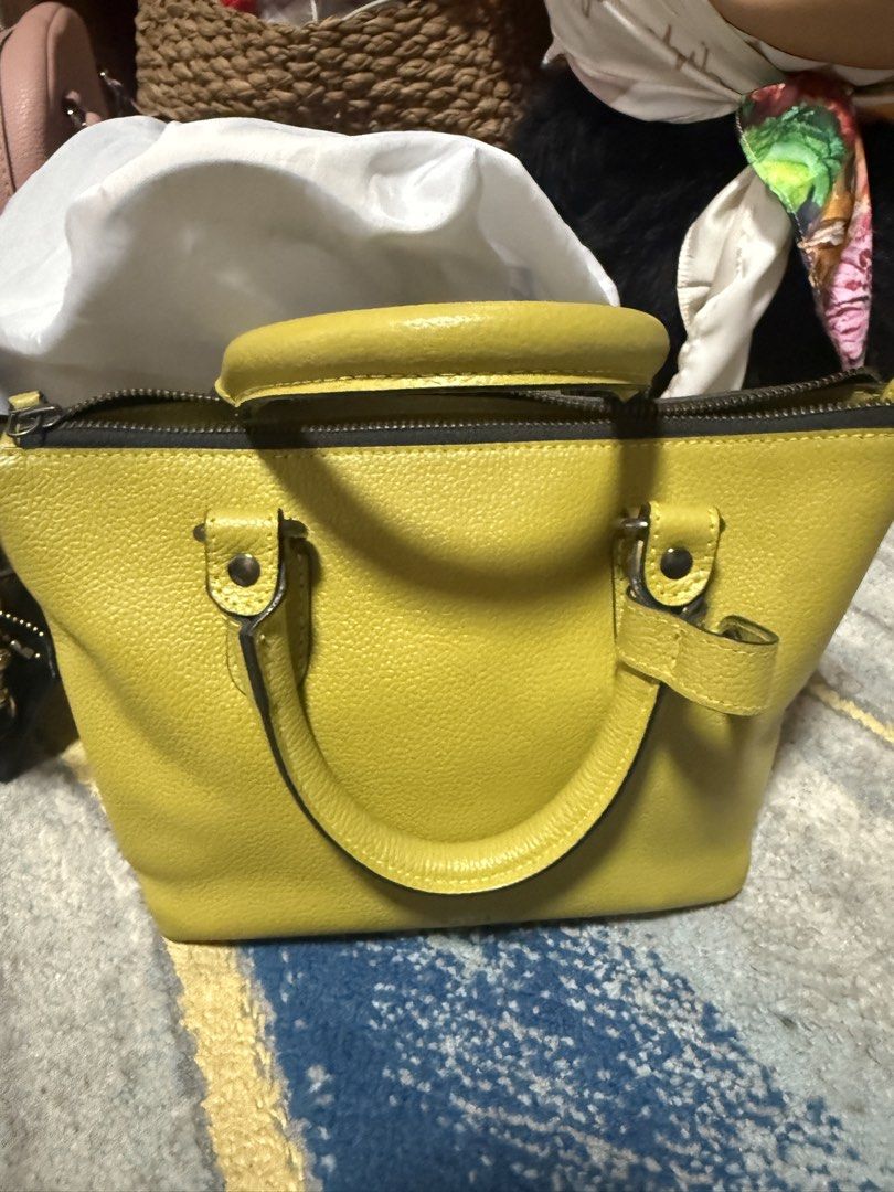 katre sling bag (Category: Cross-body Bags) located in Rizal. Submitted by vargas.cel (Listing ID 1457604516, Image 1). Description: genuine leather katre brand bought in shangrila pop up store local brand but the quality and leather is amazing bought it for 7k selling it 3800 slightly used no damage.