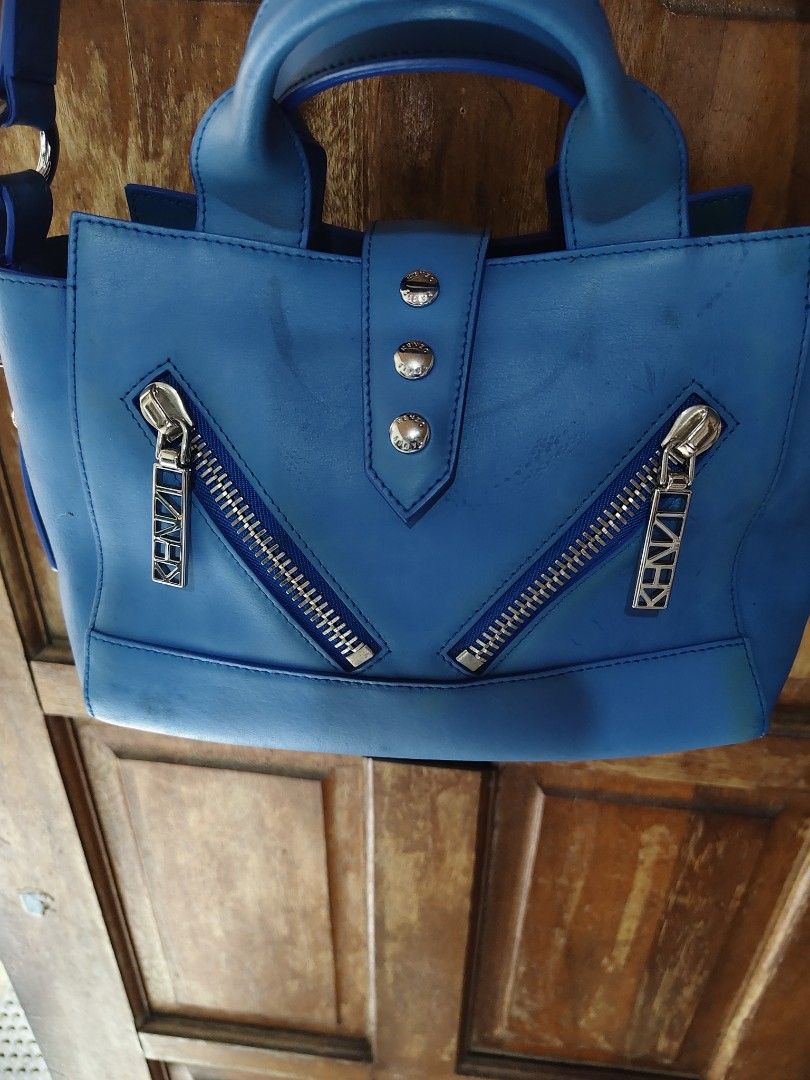 Kenzo Kalifornia Leather Bag (Category: Luxury Bags & Wallets) located in Iloilo. Submitted by branded-boy0422_16 (Listing ID 1457550691, Image 2). Description: W: 12 L: 7 Good as new Color rate Issue last picture : Sign of Usage only Ganda pa sa personal.