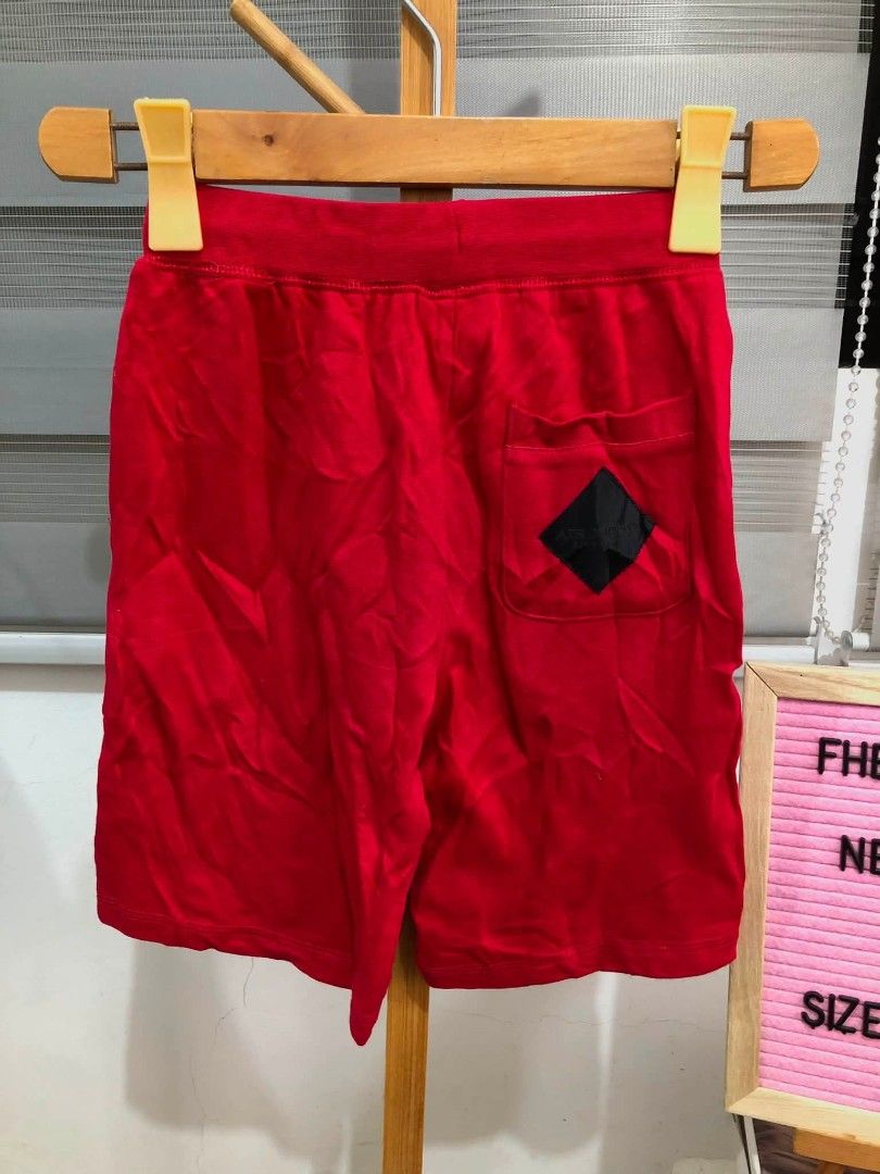 Kids Jordan Red Shorts Size 7 (Category: Babies & Kids Fashion) located in Bayambang. Submitted by ace_found_it_06 (Listing ID 1457573649, Image 2). Description: - Red Jordan Shorts for Kids - Size: 7 (fits 130/56) - Elastic waistband with drawstring - Back pocket with black diamond detail - Ideal for everyday wear or sports - Dimes: 20 - 24 x 14.5 - Issue see last photo - 9.7 Color rate DM 📩📩 - Pangasinan Based.