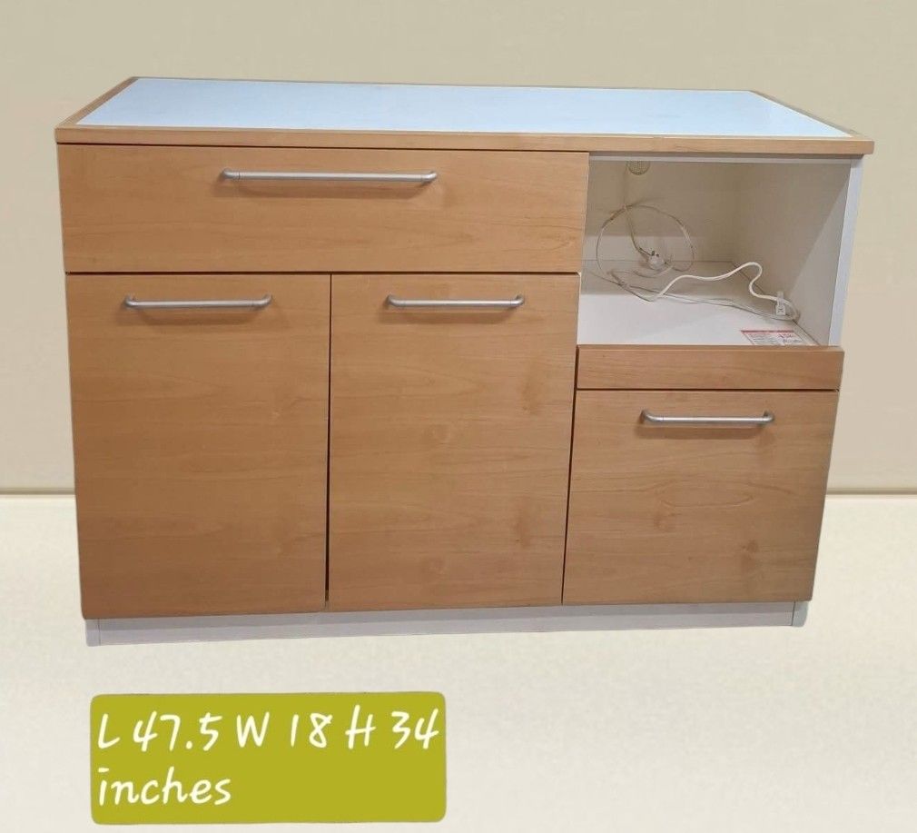 Kitchen Counter Buffet Sideboard Cabinet Coffee Nook (Category: Shelves, Cabinets & Racks) located in Quezon City. Submitted by dannikkishoppe2 (Listing ID 1457516283, Image 1). Description: Kitchen Counter Buffet Sideboard Cabinet Coffee Nook‼️₱9500‼️ *with caster wheels *compressed wood, plywood *in good condition Please manage your expectations as there might be minimal flaws. Color may vary due to lighting, it may appear darker or lighter in 