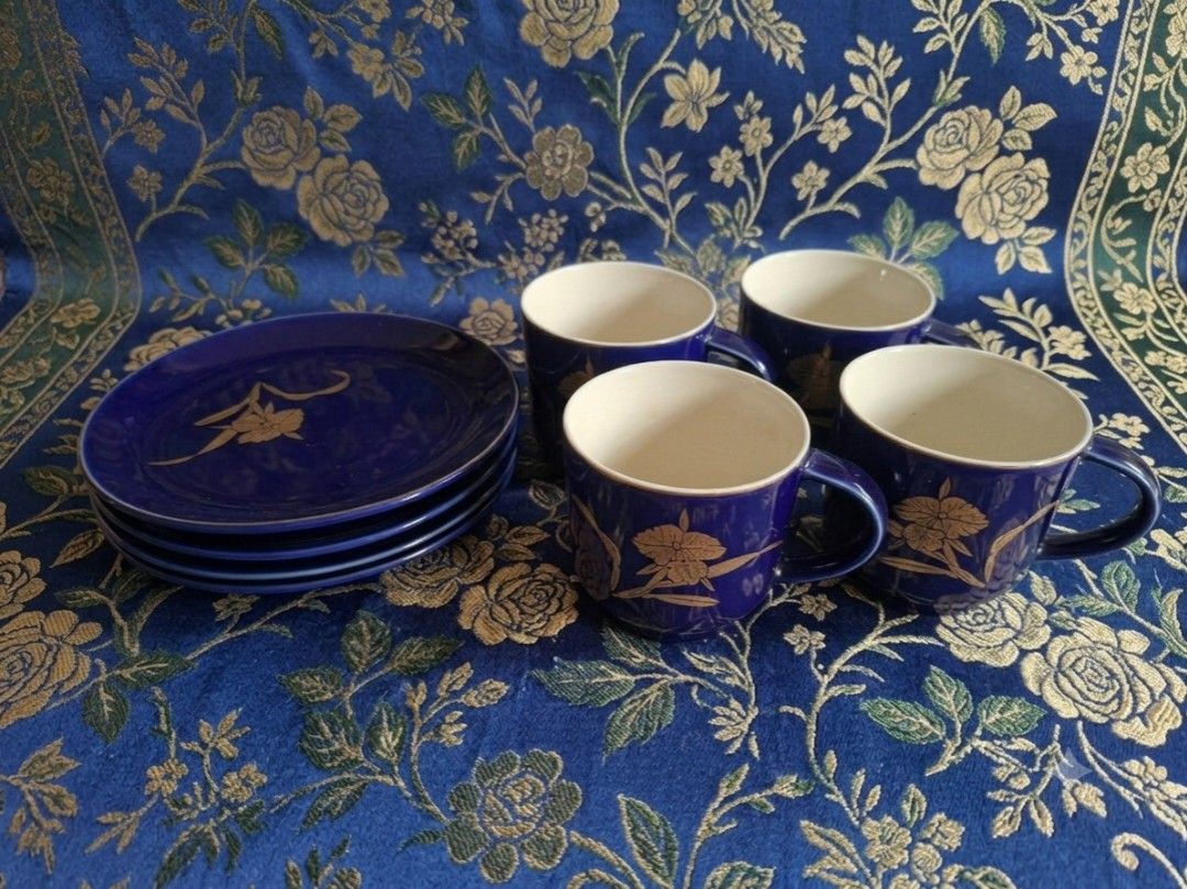 Koransha Cup and Saucer (Category: Coffee & Tea Tableware) located in Consolacion. Submitted by luxekerei (Listing ID 1457423422, Image 1). Description: - 7cm in diameter; 6cm depth - vintage Koransha cobalt blue porcelain cup and saucer sets featuring elegant gold orchid or floral motifs..