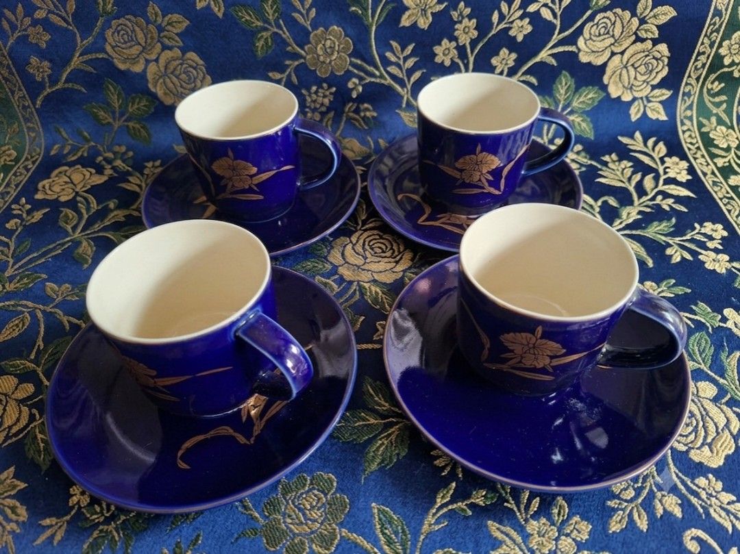 Koransha Cup and Saucer (Category: Coffee & Tea Tableware) located in Consolacion. Submitted by luxekerei (Listing ID 1457423422, Image 2). Description: - 7cm in diameter; 6cm depth - vintage Koransha cobalt blue porcelain cup and saucer sets featuring elegant gold orchid or floral motifs..