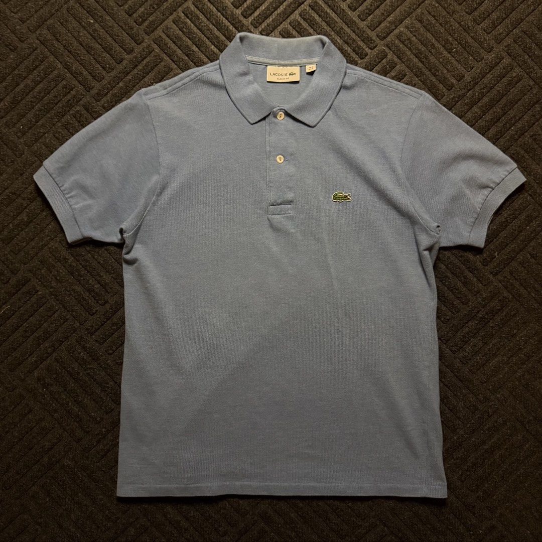 Lacoste Polo Shirt (powder blue) (Category: Tshirts & Polo Shirts ) located in Davao. Submitted by archived.status (Listing ID 1455456352, Image 1). Description: COLOR MAY VARY DUE TO LIGHTING‼️ Condition: 9.5/10 Color rate: 9.5/10 Issue: cut washtag Size Medium fit Large Width 21 Length 27.