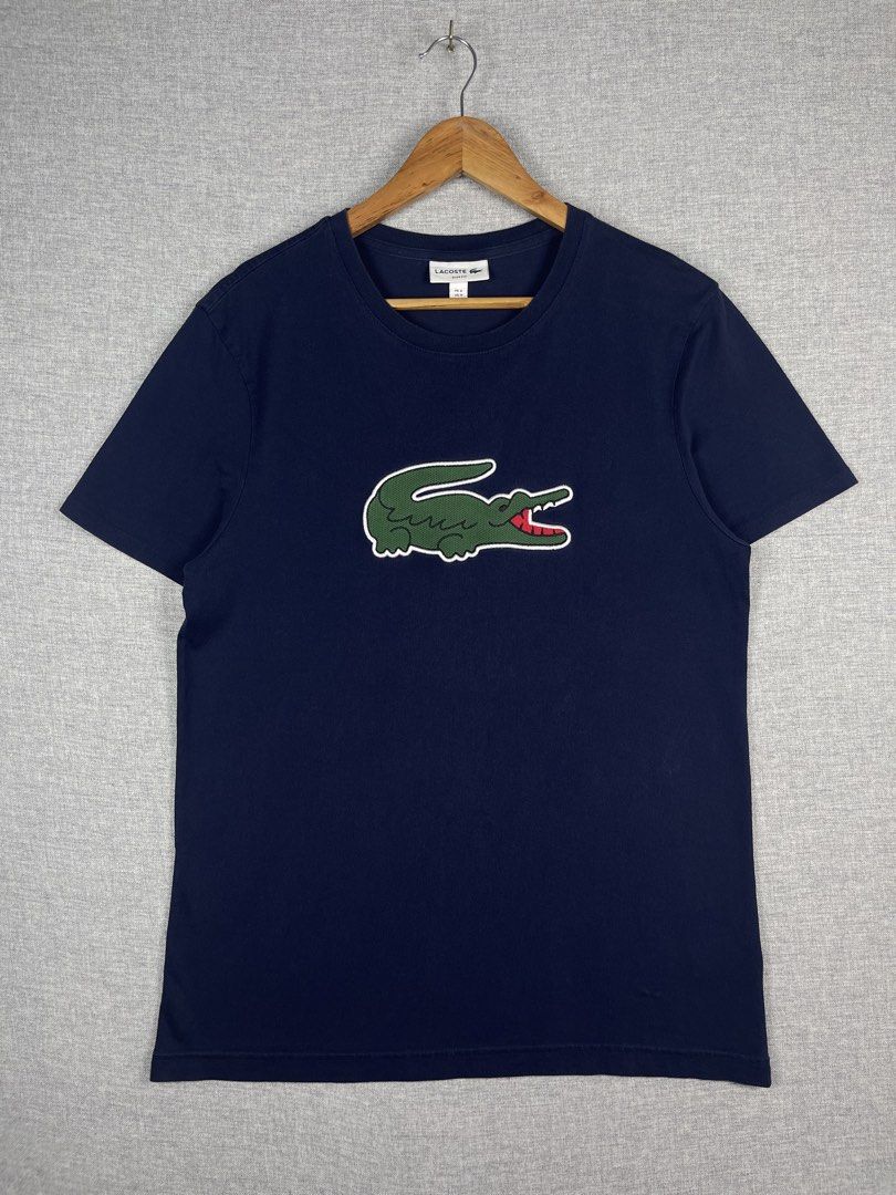 Lacoste Shirt (Category: Tshirts & Polo Shirts ) located in Guimba. Submitted by thriftandthrive19 (Listing ID 1457543464, Image 1). Description: Lacoste Size: Medium (dimension in inches) Width: 19.5 Length: 28 Condition: Excellent Issue: Restitch Color rate: 9.5.