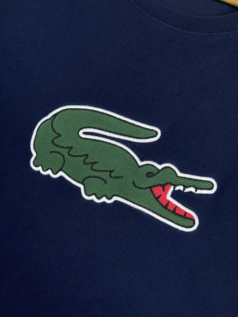 Lacoste Shirt (Category: Tshirts & Polo Shirts ) located in Guimba. Submitted by thriftandthrive19 (Listing ID 1457543464, Image 2). Description: Lacoste Size: Medium (dimension in inches) Width: 19.5 Length: 28 Condition: Excellent Issue: Restitch Color rate: 9.5.