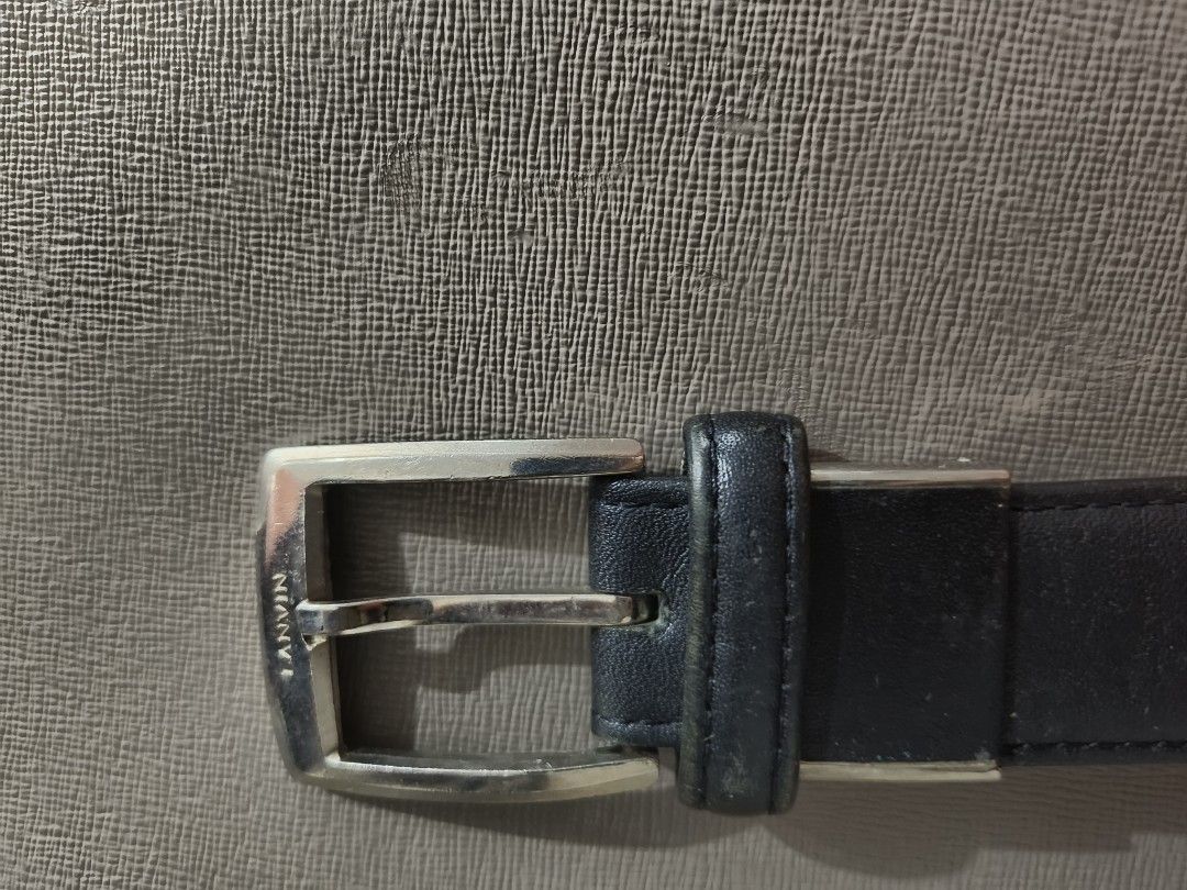 Lanvin Black Leather Belt Silver Buckle (Category: Belts) located in San Jose del Monte. Submitted by m_nshop (Listing ID 1457615205, Image 1). Description: - Authentic Lanvin black leather belt - Features a sleek silver-toned buckle - Multiple holes for adjustable sizing from Japan Auction payment first lalamove or jnt courier.