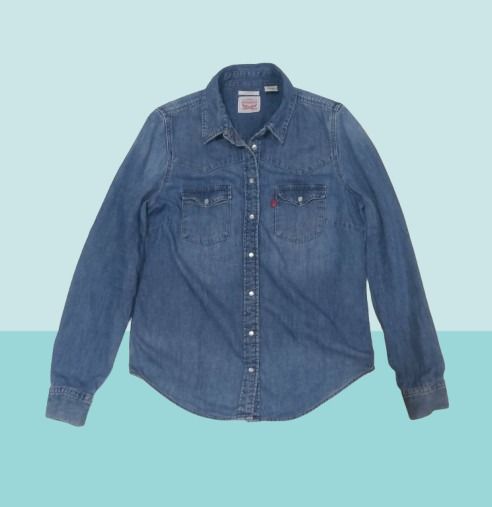 LEVI'S Blue Denim Long Sleeve Shirt (Category: Longsleeves) located in Davao. Submitted by rosewyn (Listing ID 1457575755, Image 1). Description: - Classic blue denim shirt - Long sleeves with button cuffs - Button-down front - Standard fit - Versatile for layering or wearing on its own.