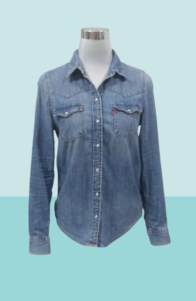 LEVI'S Blue Denim Long Sleeve Shirt (Category: Longsleeves) located in Davao. Submitted by rosewyn (Listing ID 1457575755, Image 3). Description: - Classic blue denim shirt - Long sleeves with button cuffs - Button-down front - Standard fit - Versatile for layering or wearing on its own.