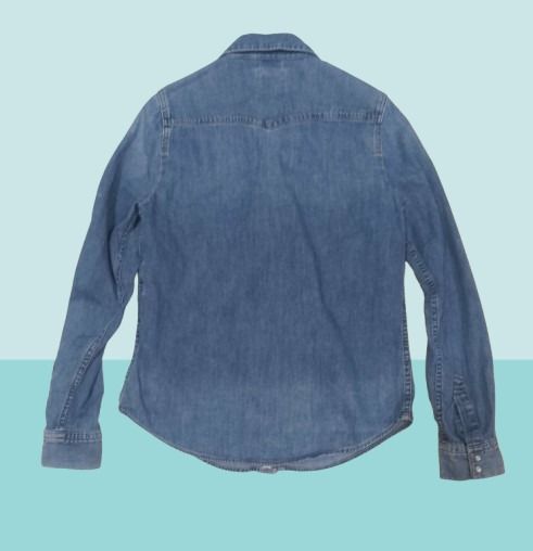 LEVI'S Blue Denim Long Sleeve Shirt (Category: Longsleeves) located in Davao. Submitted by rosewyn (Listing ID 1457575755, Image 2). Description: - Classic blue denim shirt - Long sleeves with button cuffs - Button-down front - Standard fit - Versatile for layering or wearing on its own.