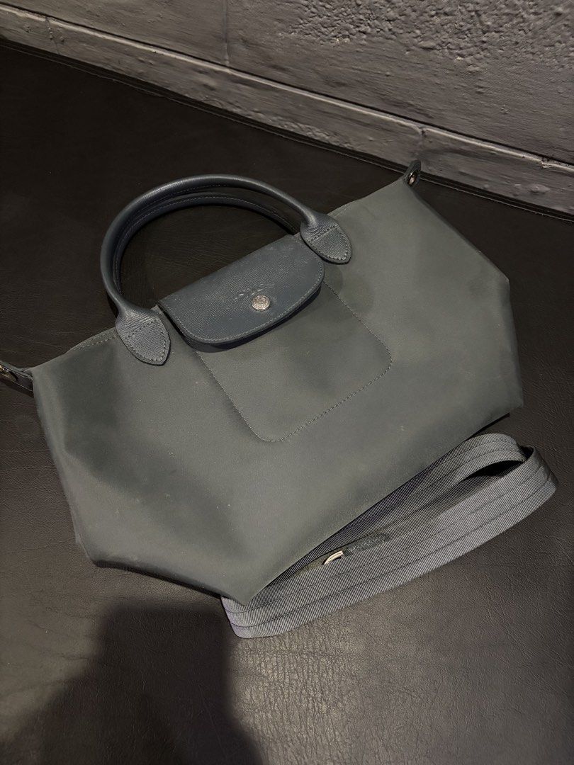 Longchamp & Lacoste Bags (Category: Shoulder Bags) located in Quezon City. Submitted by pinkplup (Listing ID 1457639291, Image 2). Description: Navy LC - ₱500 (unverified) Blue LC - ₱800 (super high quality, might be auth) Lacoste Reversible Tote - ₱800 (unverified) FREE BLACK LC AND BEIGE LC IF TAKING AS SET FOR ₱1600 .