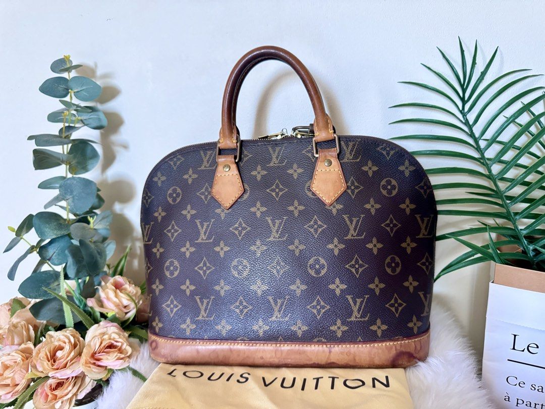 Louis Vuitton Monogram Alma Handbag (Category: Luxury Bags & Wallets) located in Santa Rosa. Submitted by martess (Listing ID 1457551086, Image 2). Description: - Classic Louis Vuitton Alma bag in iconic monogram canvas. - Interior is clean and well-maintained. - Zipper operates smoothly. - A timeless and elegant addition to any collection. - Comes with original dust bag. -vintage bag.
