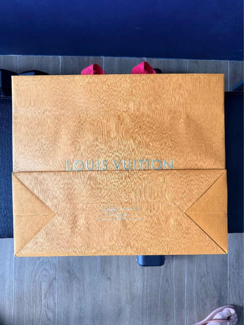 Louis Vuitton Shopping Bag (Category: Luxury Bags & Wallets) located in Marikina City. Submitted by teacher.maria (Listing ID 1457525616, Image 2). Description: This is a limited-edition Louis Vuitton 200th birthday shopping bag featuring a metallic gold pixelated portrait of founder Louis Vuitton.